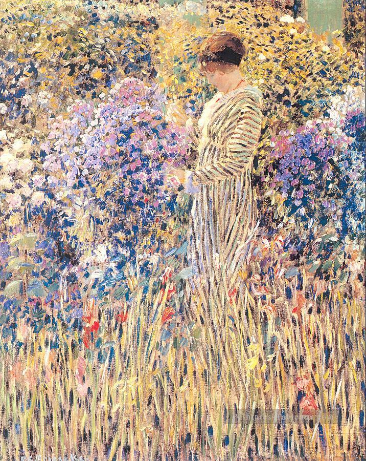 Dame dans un jardin Impressionniste femmes Frederick Carl Frieseke Peintures à l'huile